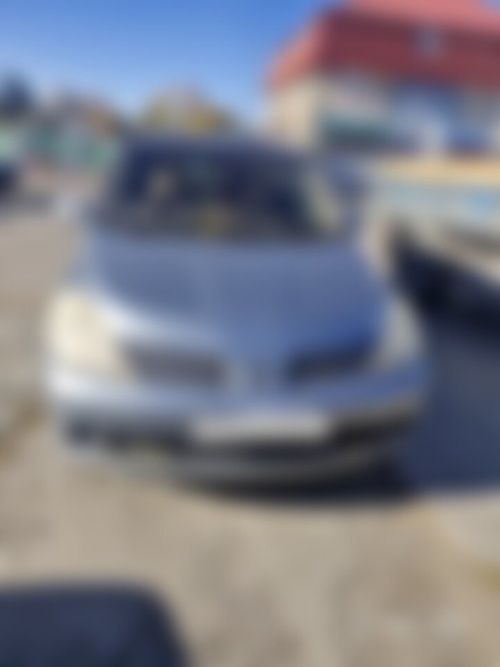 Nissan Tiida 2004 г