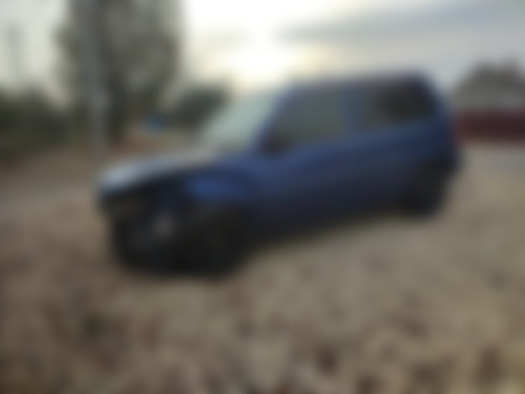 Mazda Demio 2002 г